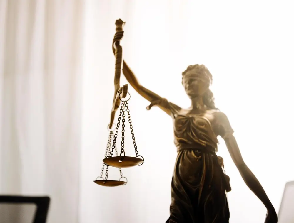 Scales of justice on an attorney's desk